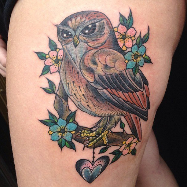 Awesome Heart Holding Owl traditional tattoo