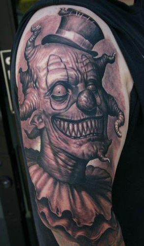 Creepy Evil Clown tattoo on Shoulder