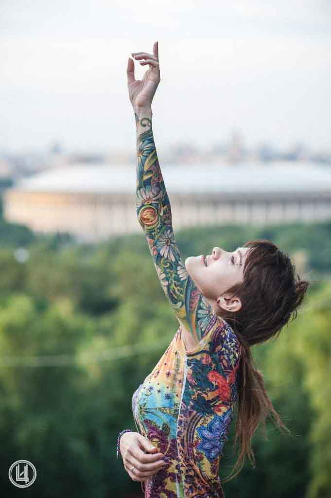 Flower Hand tattoo to sky