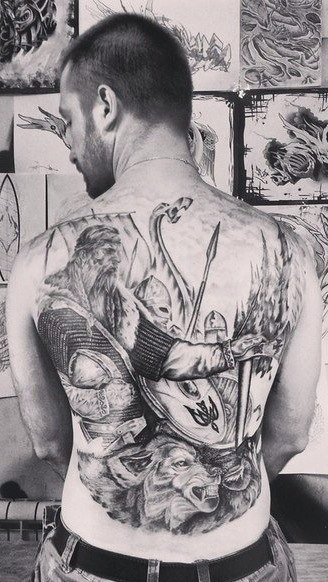 Graphic Viking Warriors Squad tattoo on back