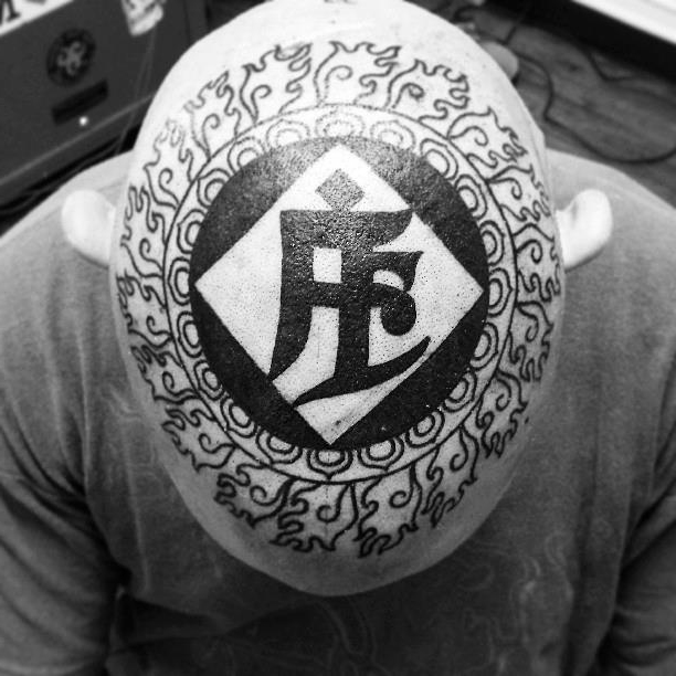 Hindu Script Head tattoo