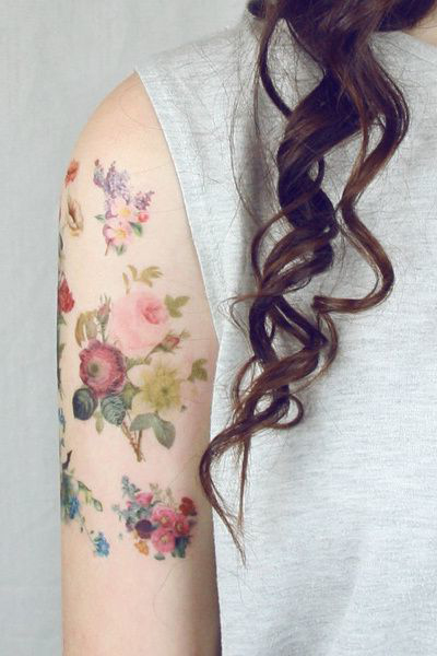 A lot of Little Aquarelle Flower Tattoo on Shoulder