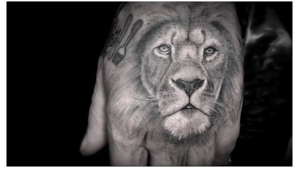 Back of the Hand Realistic Lion tattoo by Dr Woo