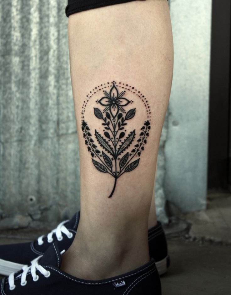 Dotwork Symbolic Flower tattoo on leg