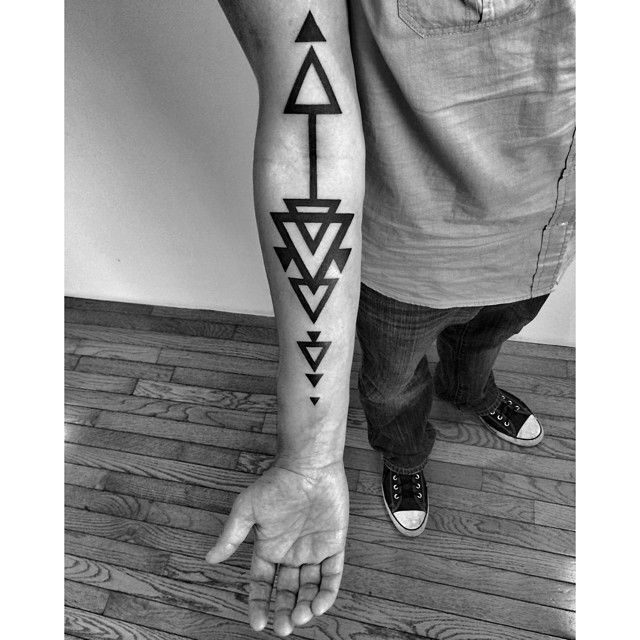 Down arrows Blackwork tattoo