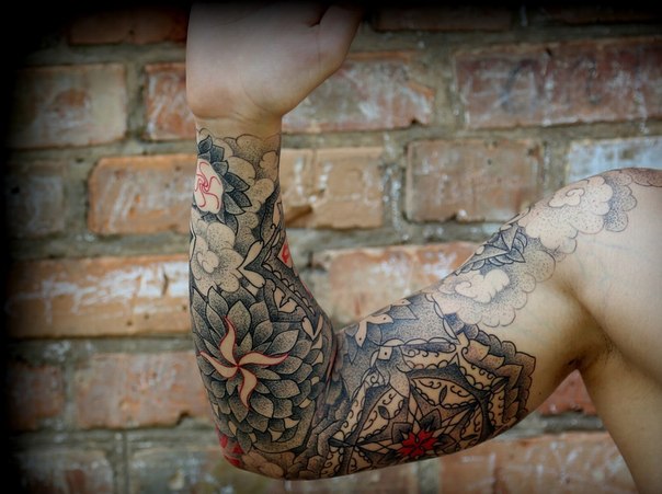 Mandala Dotwork tattoo sleeve with red