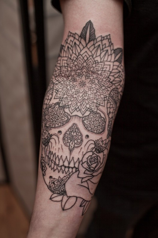 Mandala Scull tattoo on Hand