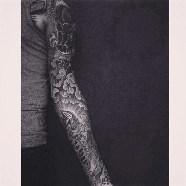 Skeleton and Minotaurus tattoo sleeve