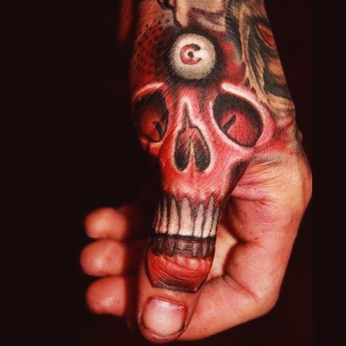 Third Eye Scull New School tattoo on Thumb