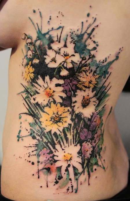 Field Flowers tattoo on back