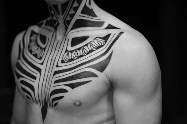 Ethnic Chest and Neck Blackwork tattoo