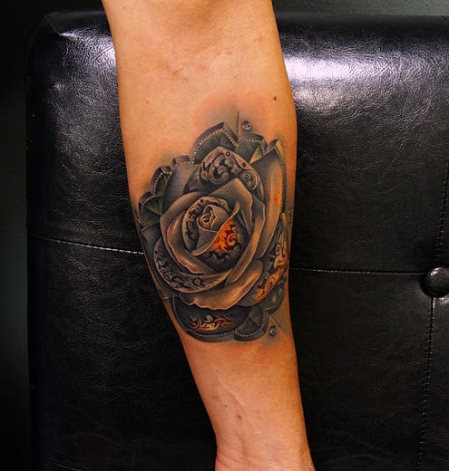 Amazing Metal Rose tattoo by Andres Acosta