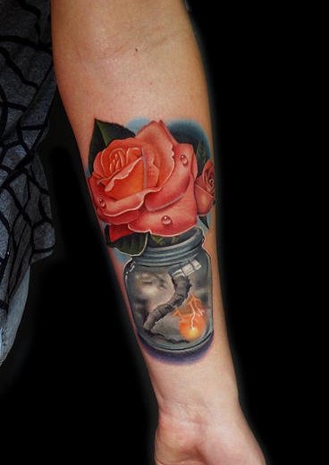 Beauty After Storm Rose in Can tattoo by Andres Acosta