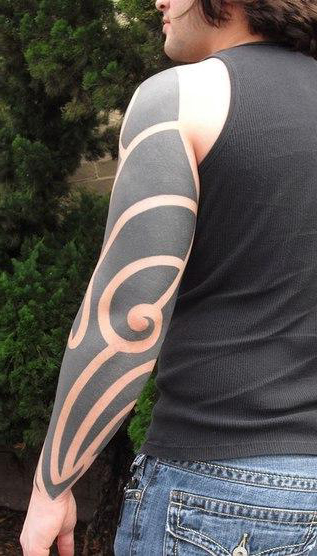 Big Tribal Arm Blackwork tattoo