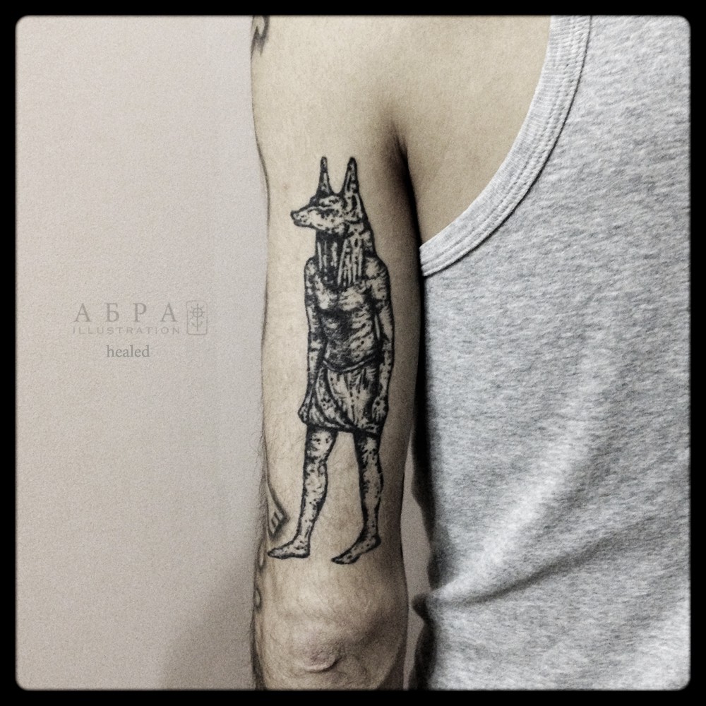 Blackwork Anubis tattoo by Abra Black