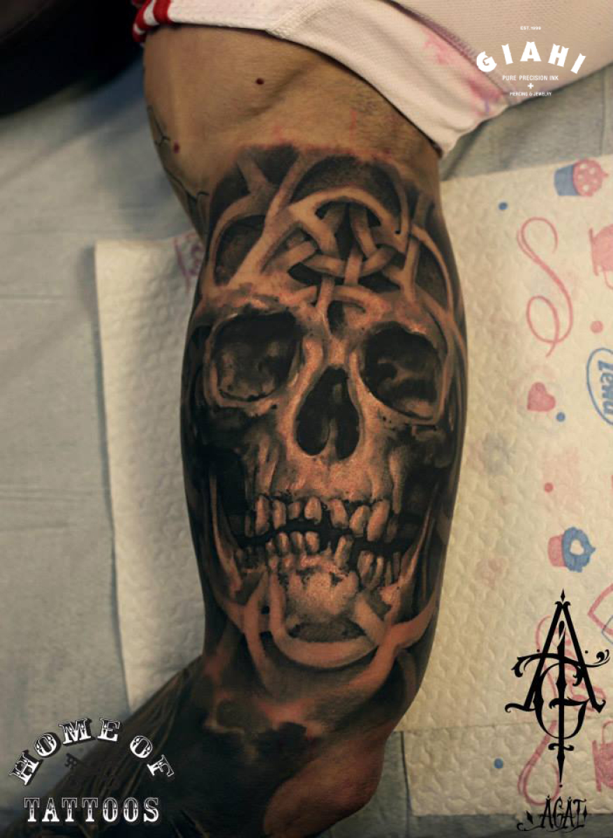 Blackwork Biceps Skull tattoo by Agat Artemji