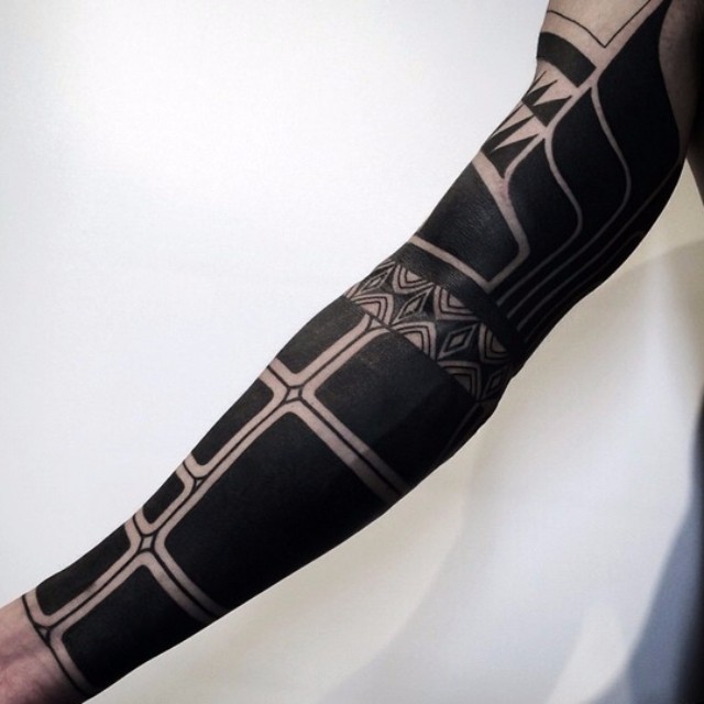 Blackwork tattoo sleeve by Nissaco Tatau