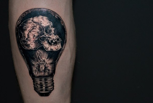 Candle and Scull Inside Bulb Blackwork tattoo