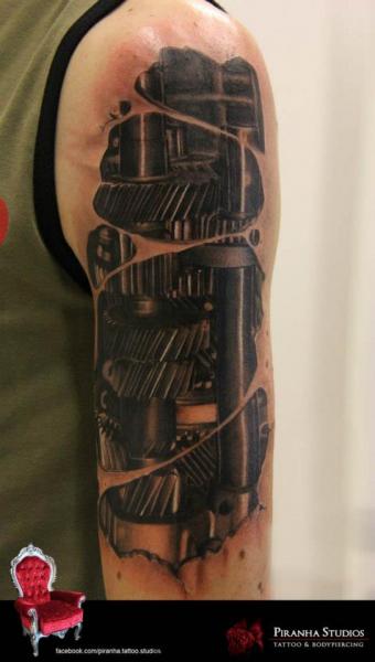 Cogwheel Mechanism Shoulder Biomechanical tattoo by Piranha Tattoo Supplies