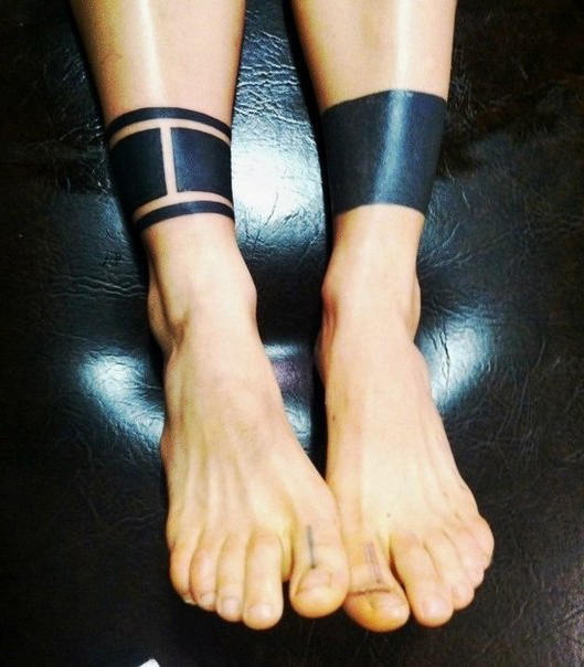 Different Leg Bracers Blackwork tattoo