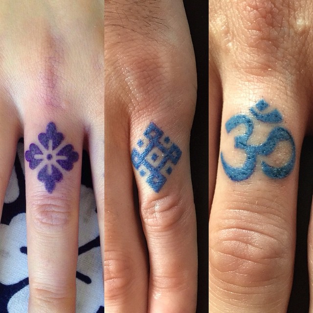 Finger Symbols tattoos by Kat Blackstone