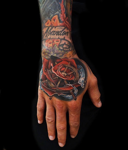 Great Ship Wheel Rose tattoo by Andres Acosta