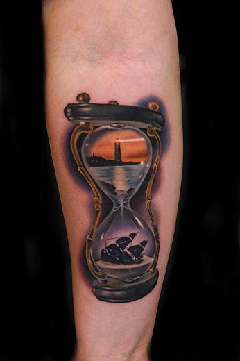 Lighthouse and Sinking Ship Hourglass tattoo by Andres Acosta