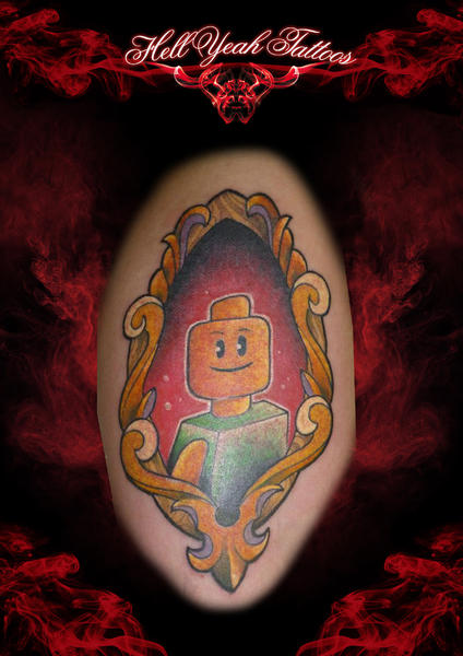 New School Framed Man Lego tattoo by Hellyeah Tattoos