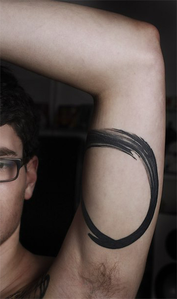 Paintbrush Circle Blackwork tattoo