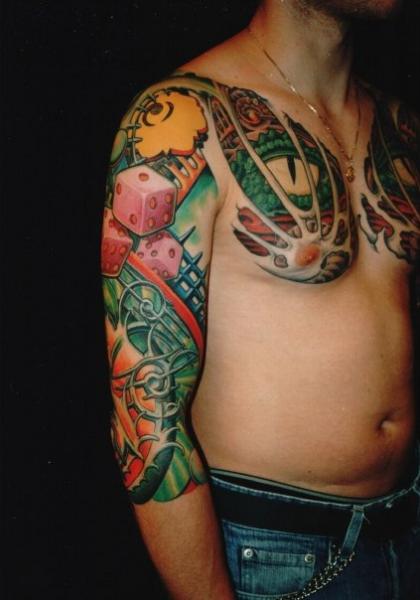 Snake Eyes on Chest and Gambling Sleeve tattoo by Skin Deep Art