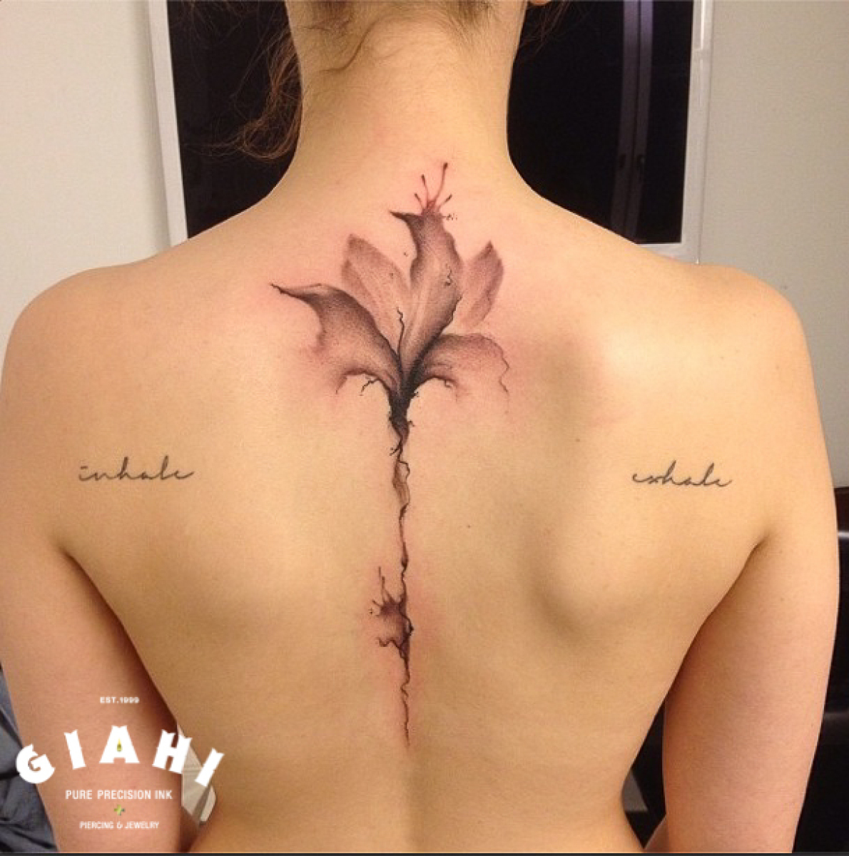 Spine Flowers and Lettering tattoos by Roony