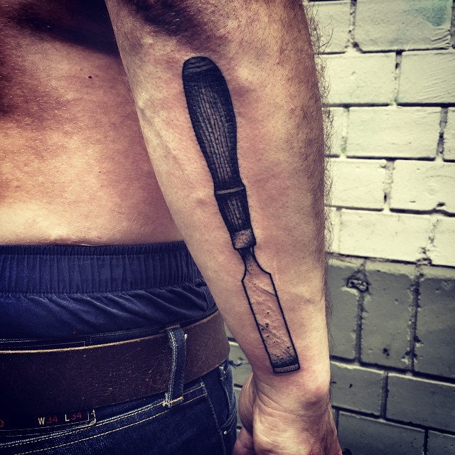 Arm Chisel tattoo