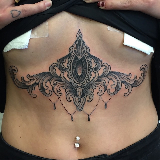 Baroque Underboobs tattoo