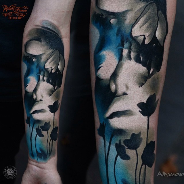 Dual Face Skull on Arm