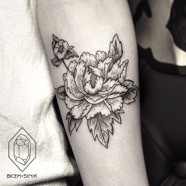 Flower tattoo on Ankle