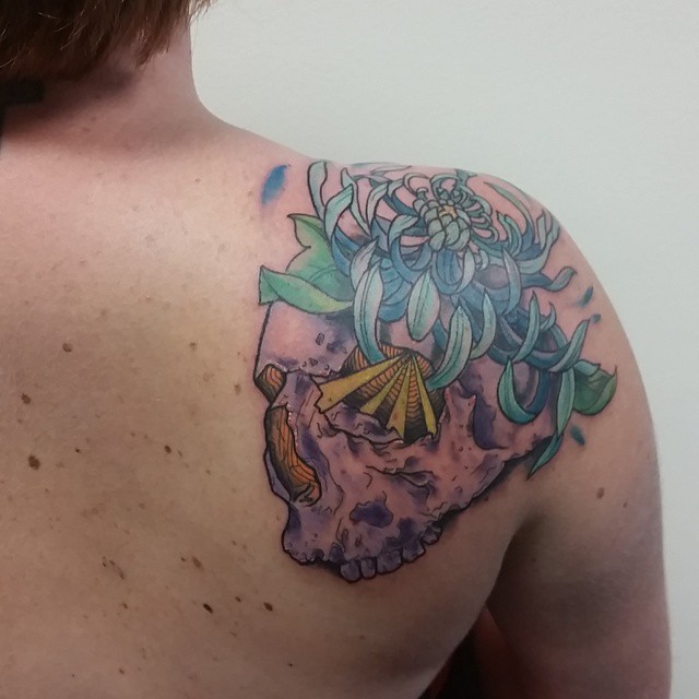 Blue Flower Pink Skull tattoo