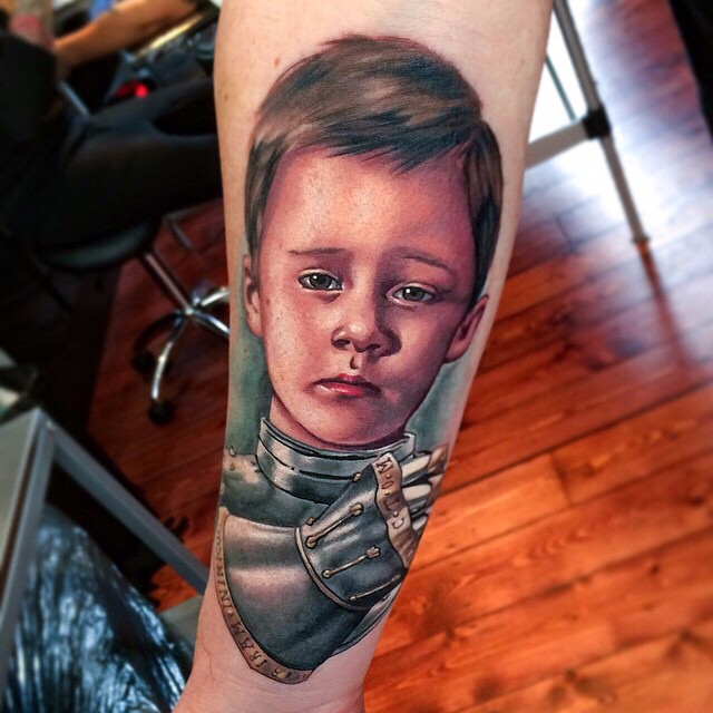 Child Knight tattoo on Arm