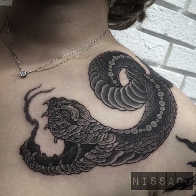 Fat Face Black Snake tattoo