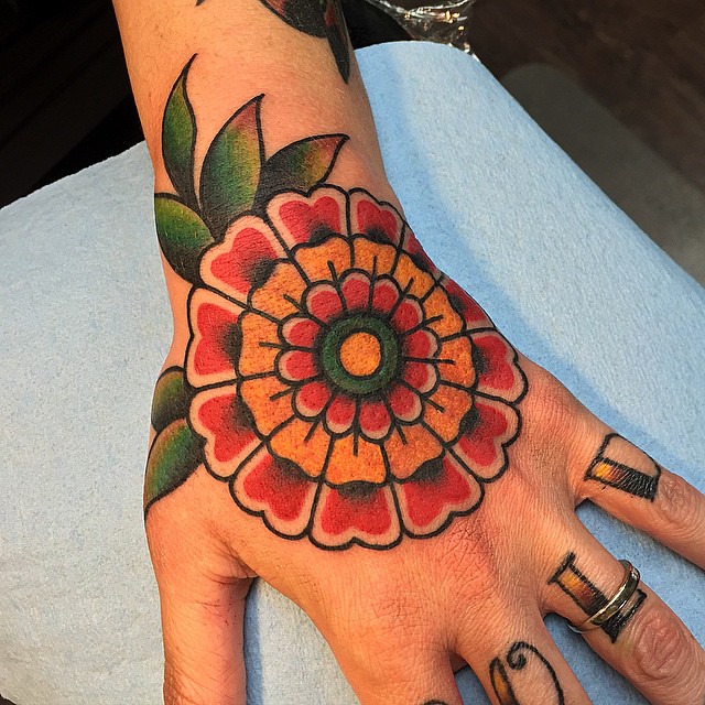 Great Flower Hand Tattoo