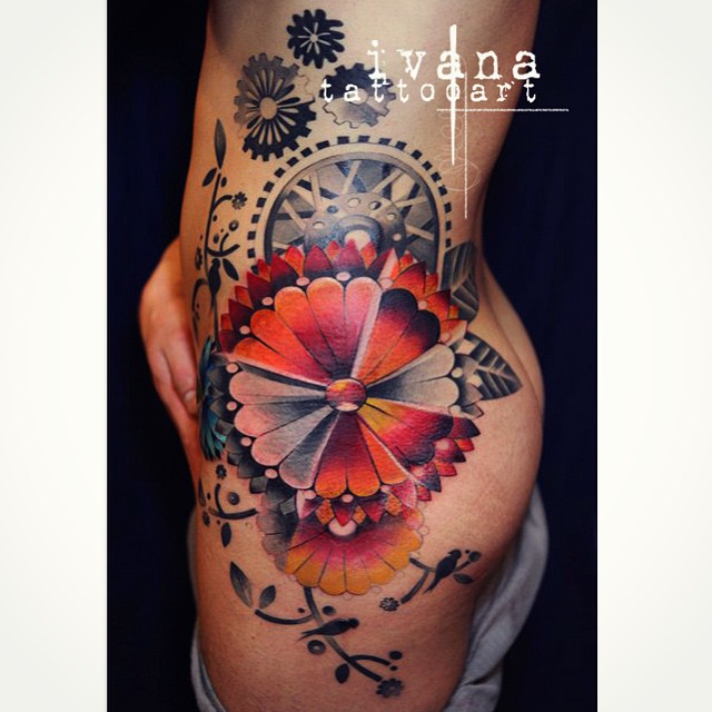 Mechanical Flower Hip tattoo