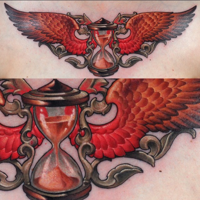 Orange Wings Hourglass tattoo