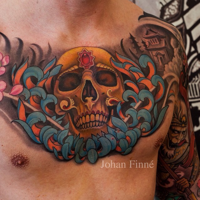 Ruby Forehead Skull Chest tattoo