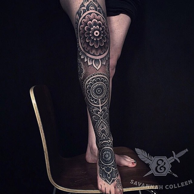 White on Black Mehendi Leg tattoo