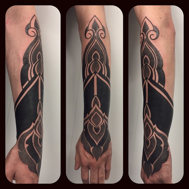 Black and Dotwork Arm Tattoo