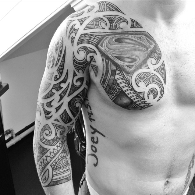 Chest and Sleeve Maori Superman Tattoo