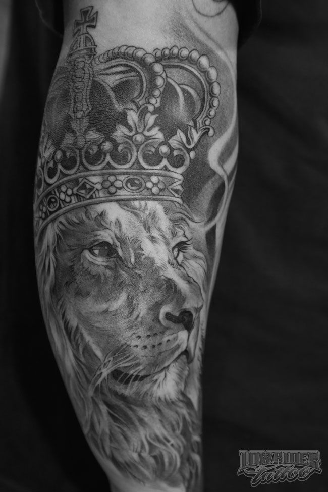 King Of Kings Lion Tattoo on Arm