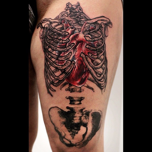 Ribcage Hear Tattoo on Thigh