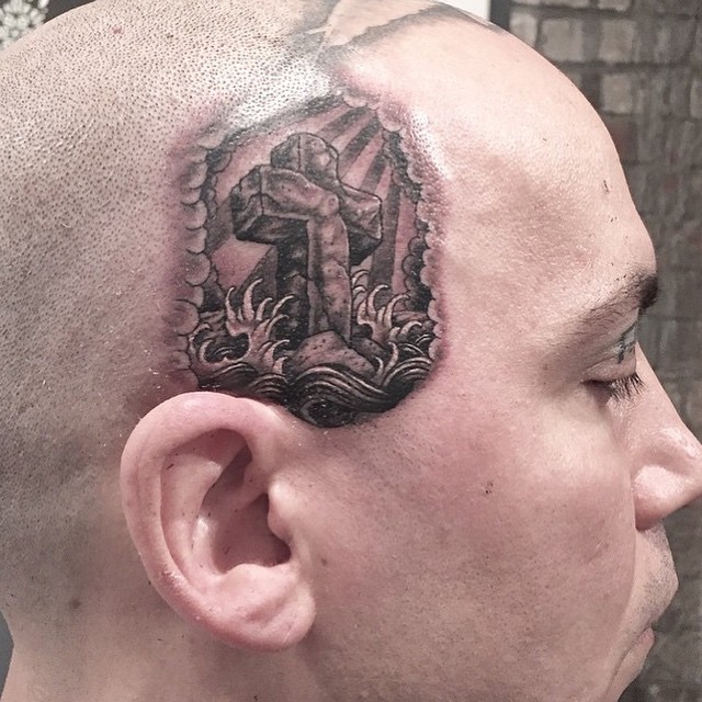 Water Crucifix Head Tattoo