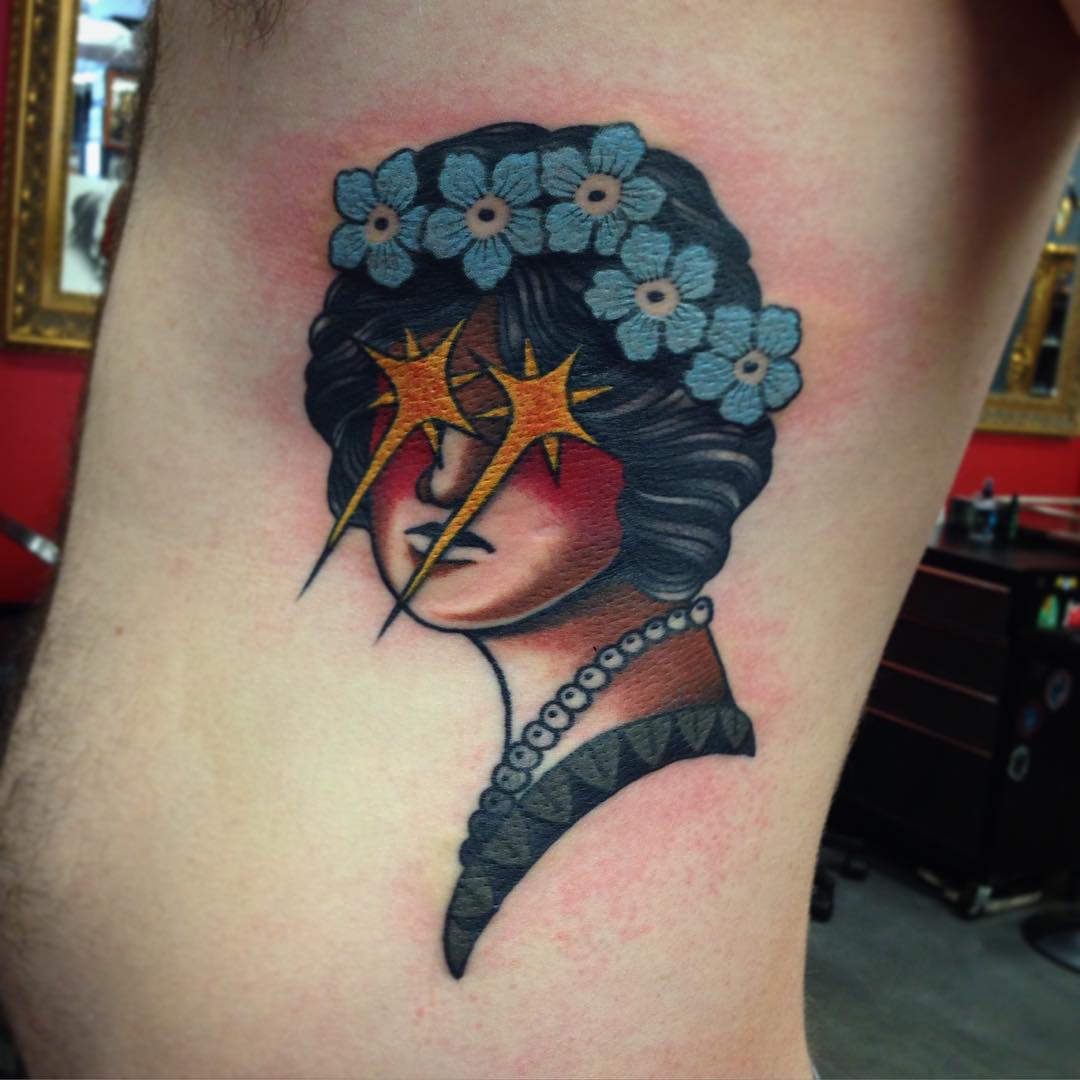 Sparkle Eyes Girl Tattoo on Ribs