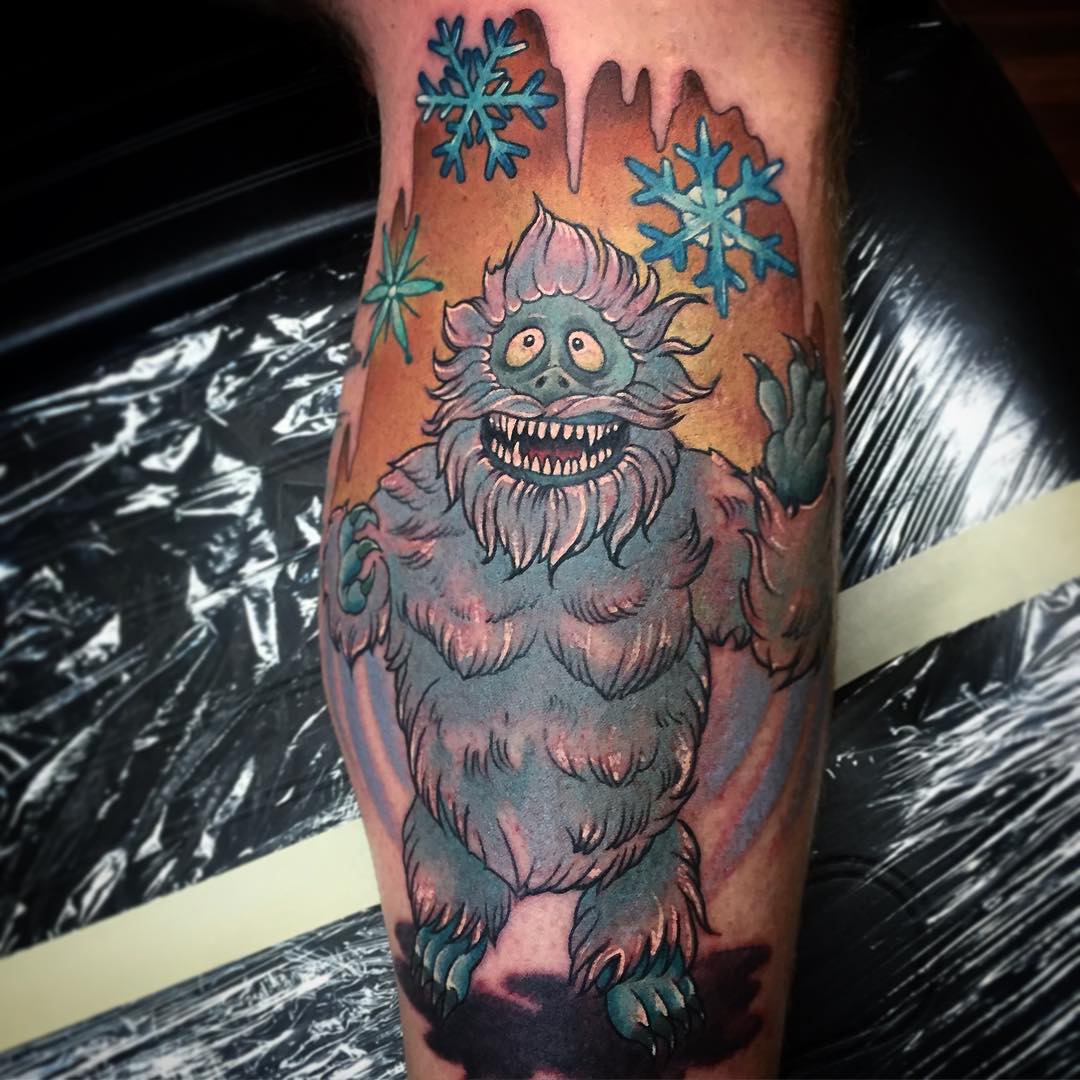 funny new school tattoo of a bigfoot